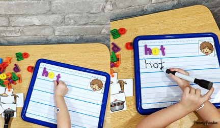 Picture of whiteboards at a small group table. Dry erase boards are the perfect tool for making words and sentences!