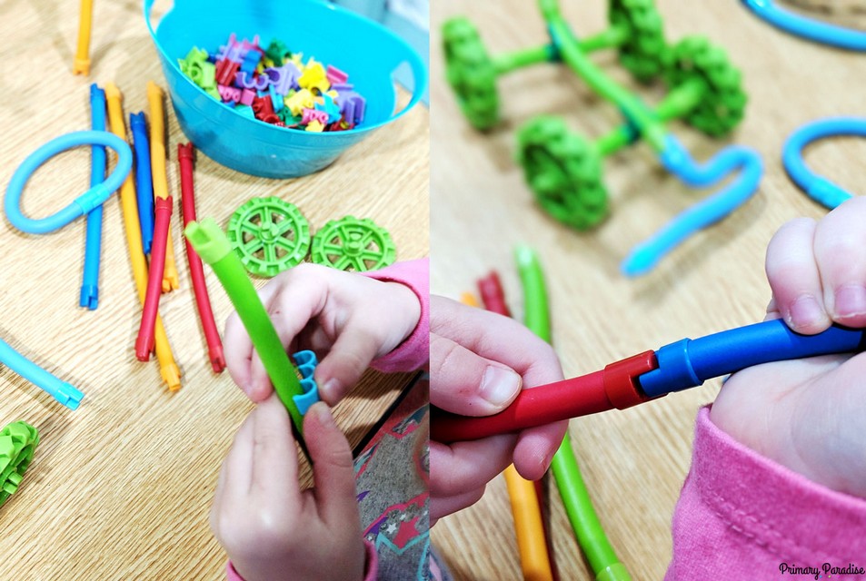 Image of student connecting magic wand STEM pieces to build a fun creation