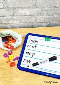 Use white boards or dry erase boards to play the mystery alphabet game! 