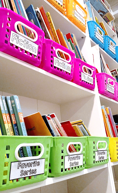 Create a beautiful and organized playroom library or classroom library with this simple color coded system using bins and stickers from Oriental Trading and Primary Paradise.