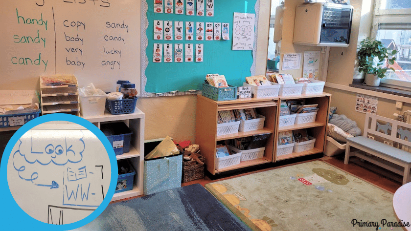An image of a classroom library with books in white baskets. 