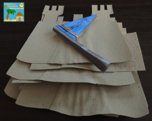 Sand paper sandcastles for beach themed birthday board 10