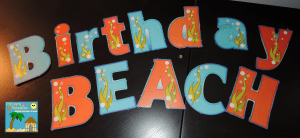 Sand paper sandcastles for beach themed birthday board 13