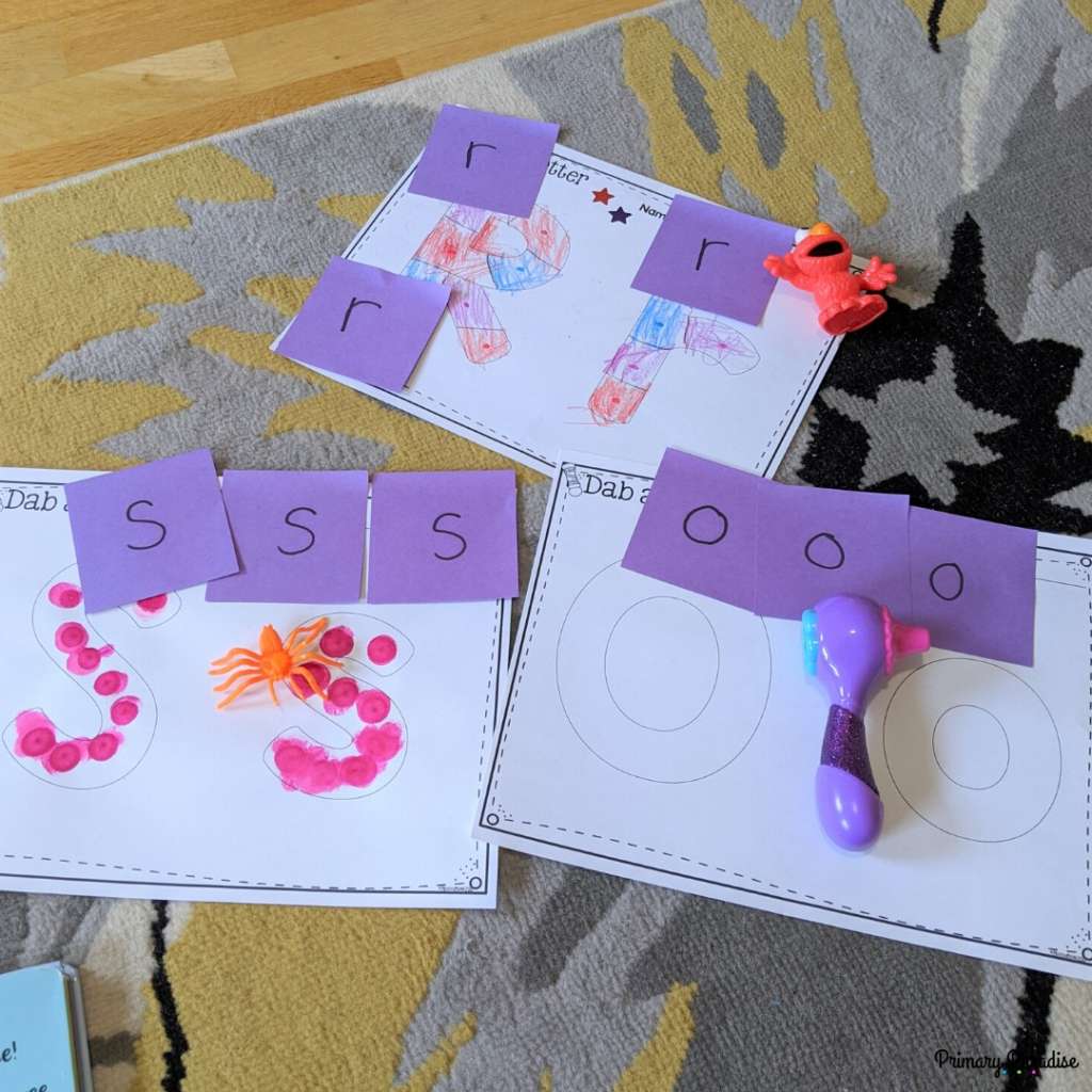 letter posters with matching sticky noted and real objects for sound cues- s-spider, r- red Elmo, o- otoscope