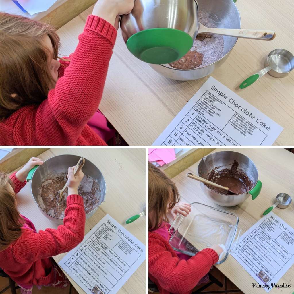 little girl baking a cake and looking at a recipe